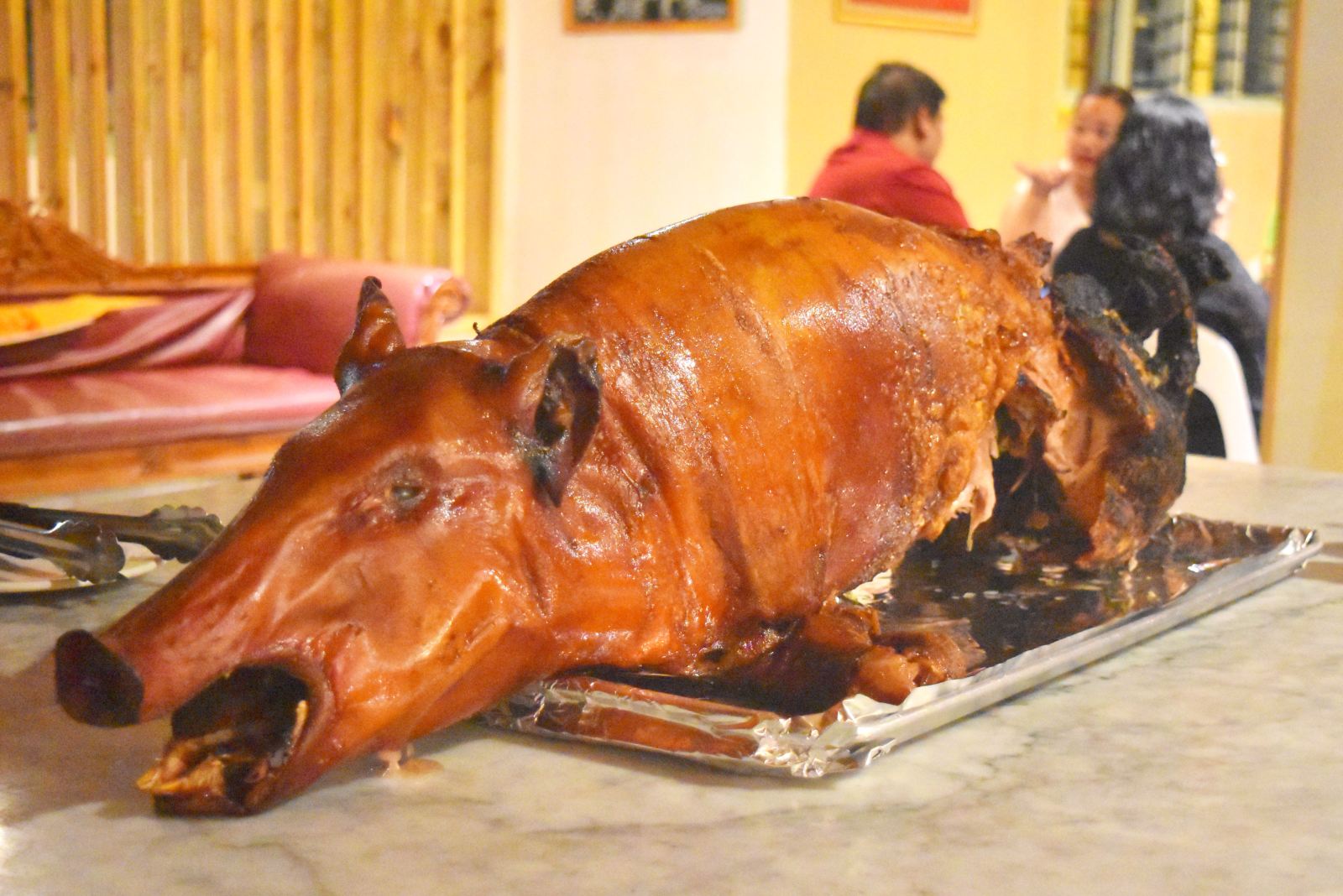 Roast-pig-spit-roast-vakaloa-Mandatory-credit-to-TongaPocketGuide.com-Feature.jpg
