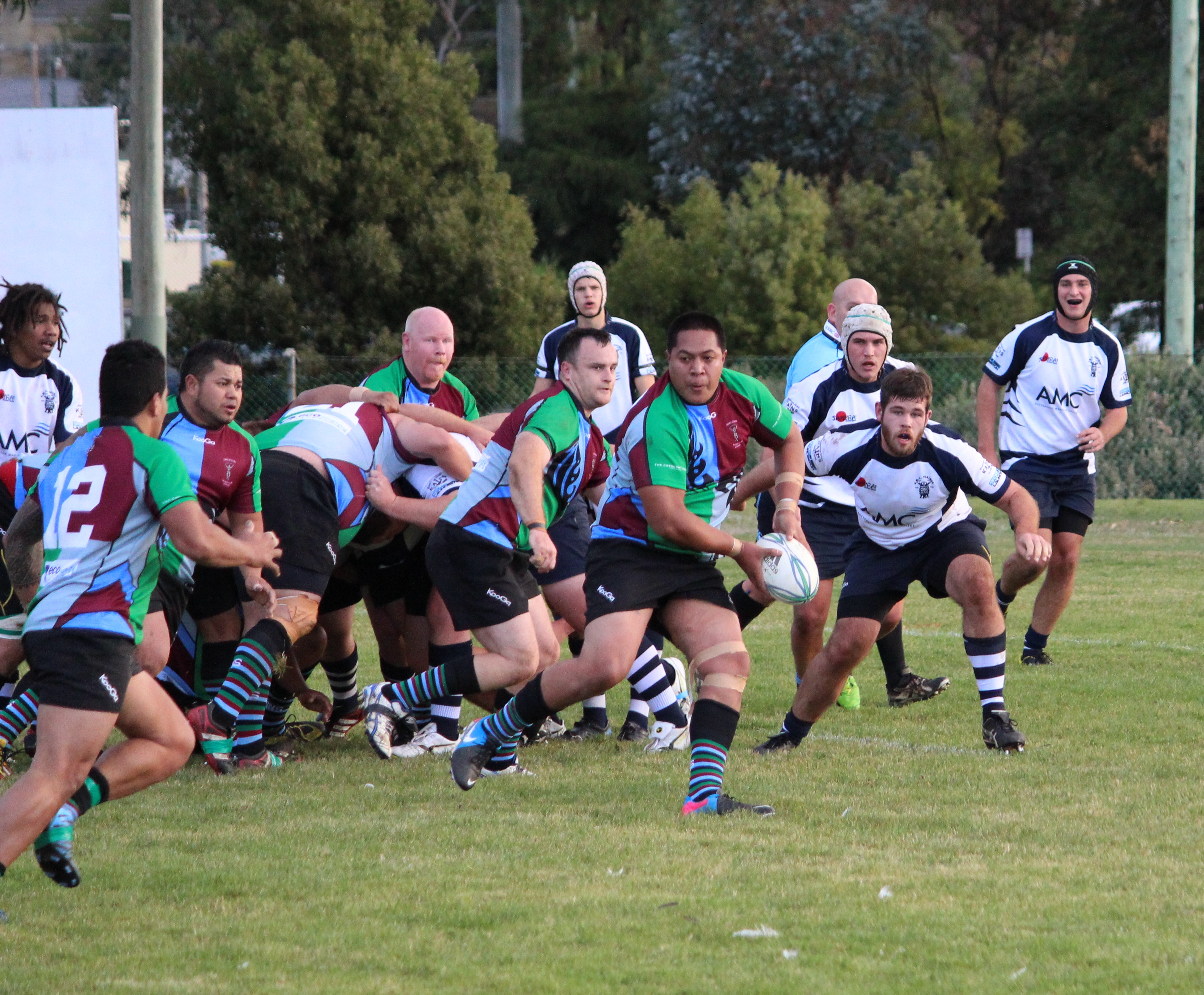 Hobart Harlequins Number 8 Don Leota tests the AMC Vikings defence at Rugby Park in Hobart. 