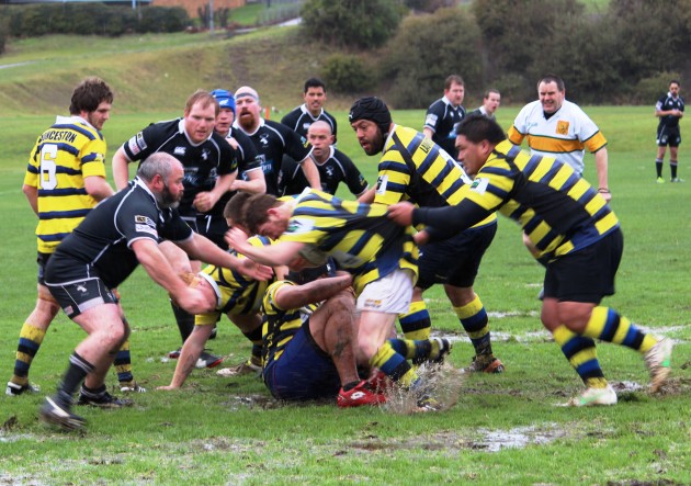 Launceston's Perry Chancellor ploughs into the Glenorchy line