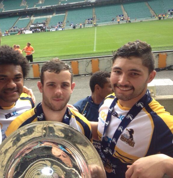 Henry Speight, Robbie Coleman and Colby Fainga'a with the trophy