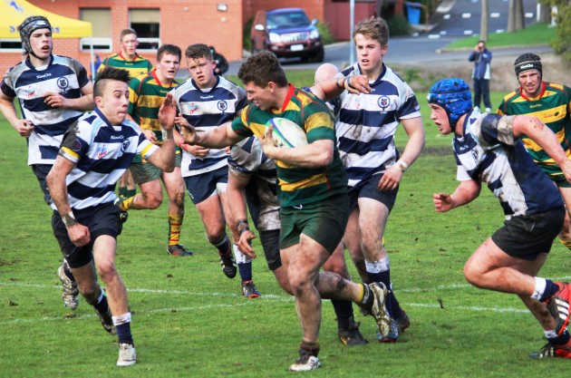 Launceston prop Jack Briggs leads the Tasmanian Under 18 attack against Victorian Schools