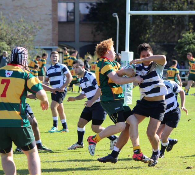 Devonport and Tasmanian Under 16 No8 Tom Curtis wrests the ball from his Victorian Schools opponent.