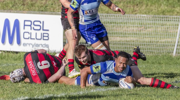 Parramatta centre Tui Faasisila leaves a trail of defenders as he scores a try_photo by Pat Dunne