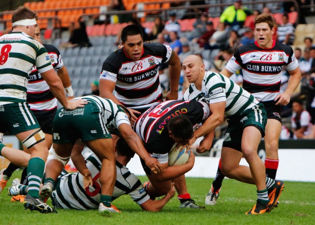 Wests prop Dave Lolohei is stopped short of scoring by Warringah. Photo - Karen Watson