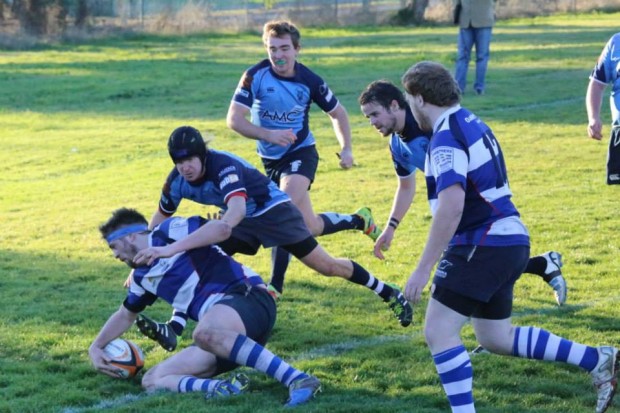 Taroona's James Holman scores for the Penguins