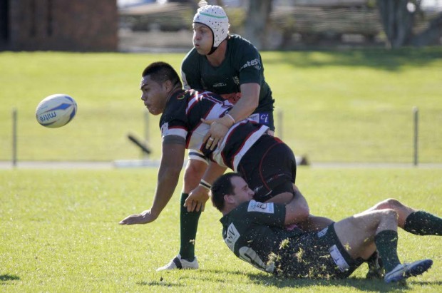 Waratahs Stephen Hoiles and Matt Carraro team up to stop Michael Alaalatoa