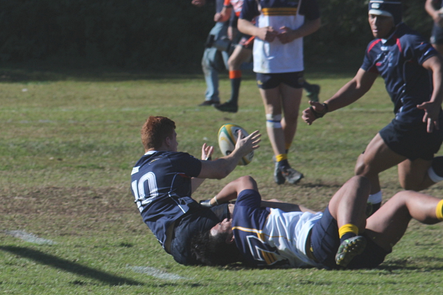 Billy Gray pops ball up to Ikapote Tupai who scores