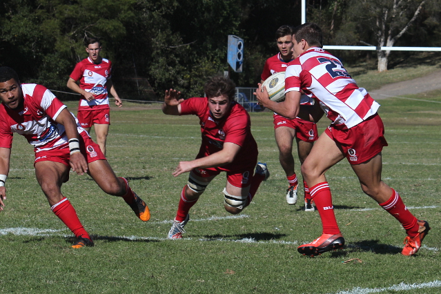 Kallan Coventry getting ball from Geoffrey Robertson who would score a remarkable try when he got it back