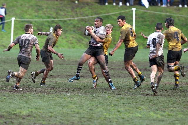 Hawkins manhandling Loga -Tarogi in the wet.