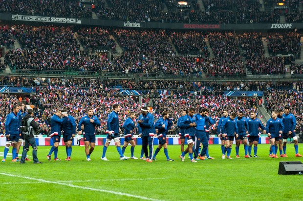The crowd errupts after the French national anthem finishes.