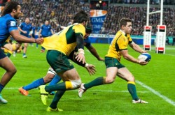 Australia's Bernard Foley passes to Adam Ashley-Cooper, who scores Australia's first try