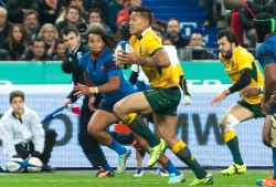 Wallaby full back Israel Folau makes a break down the eastern wing, with Addam Ashley-Cooper in support.