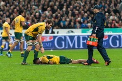 Wallaby outside centre Tevita Kuridrani lays injured on the field following the Wallabies' second try.