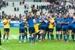 French Captain, Thierry Dusautoir holds aloft the Trophée des Bicentenaires at Stade de France after defeating the Wallabies 29-26