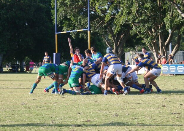 Referee Simon Moore gives one of 29 penalties in the game.