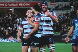 Happy Rebels Harris and Neville congratulate Debreczeni