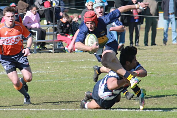 ACT fullback Harry Leddy well-tackled