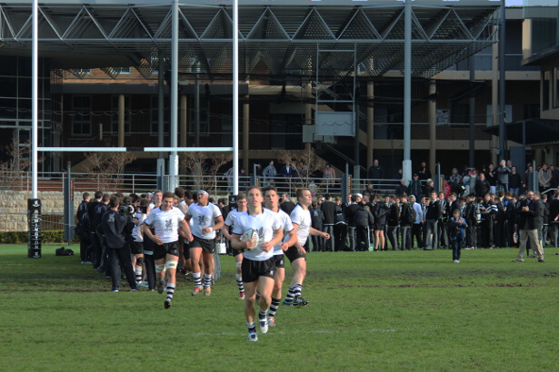 Cameron Murray leads Newington onto the ground