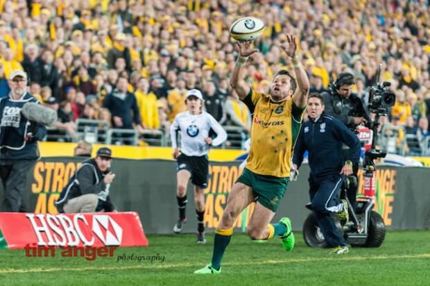 Wallabies' winger, Adam Ashley-Cooper keeps his eyes on teh cross kick from Matt Toomua.