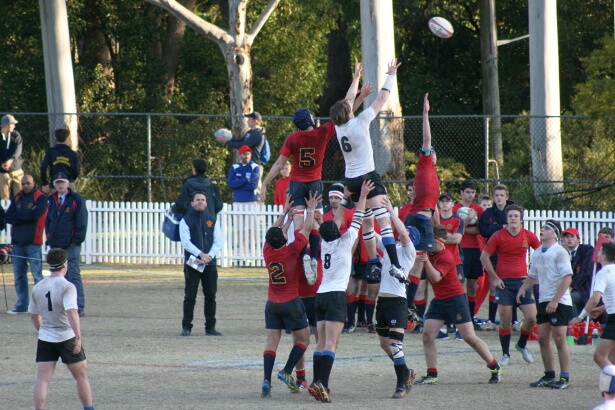 Lachlan Swinton take the ball