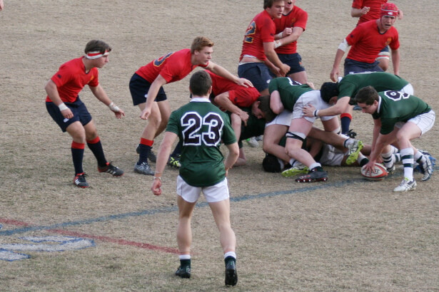 Marcus Trevina (No. 23) who scored the final try for Trinity watches on.