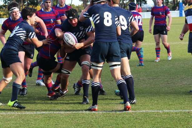Rory Suttor rips the ball to save a try