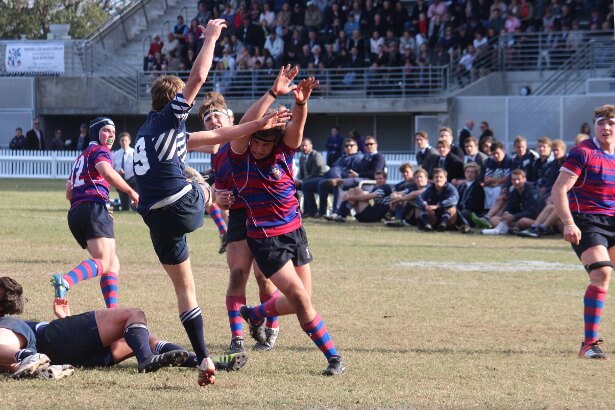 Try scorer Oscar Lane clears his line