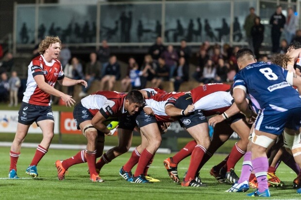 Jarrad Butler, with gritted determination, holds the ball at the back of yet another Vikings' maul, as it heads for the try line.