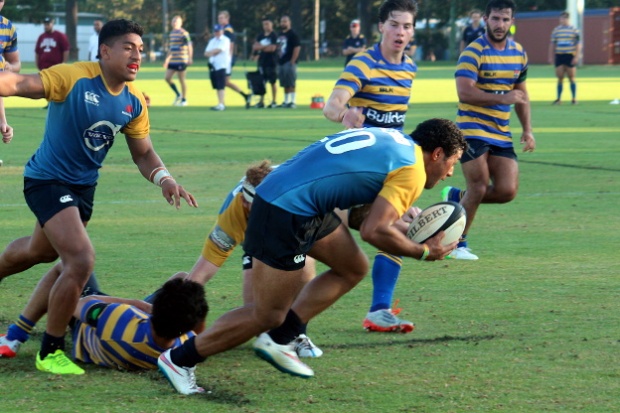 Sione Afu takes the ball up