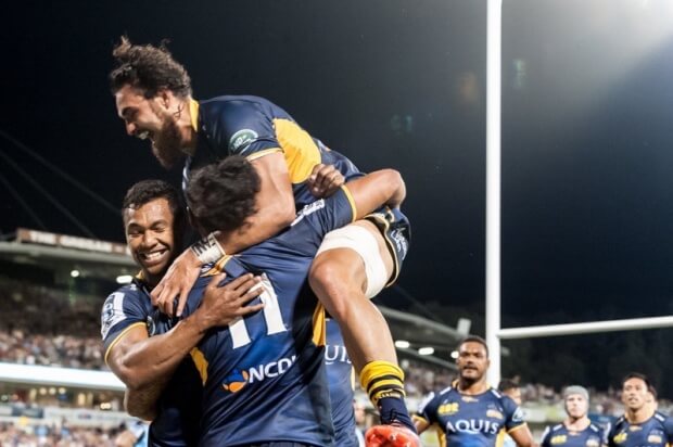 Aidan Toua and a very jubliant Jordan Smiler join in the celebrations folowing Joe Tomane's try.