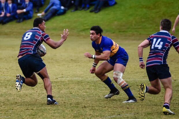 Toowoomba winger Ashton Watson prepares to tackle TSS No. 8 Tipene Mavoa