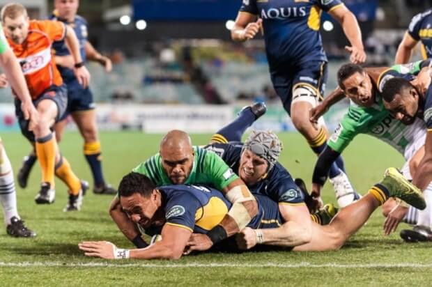 Brumbies' replacement Lausii Taliauli crashes over for a 'try'.