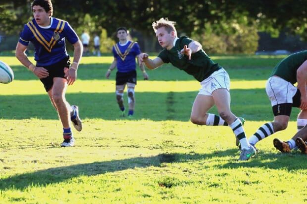  Trinity's scrumhalf Cooper Chambers gave good service to his backs