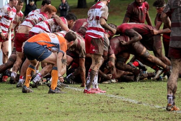 Queensland Two defends in the mud against Queensland One 