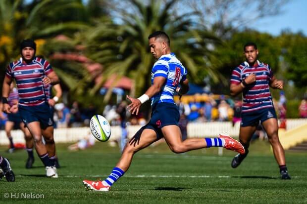 Nudgee captain Augustus Rangihuna clears the ball