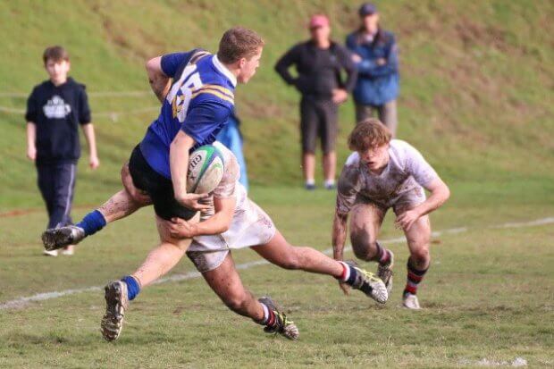 James Mood offloads in a driving tackle