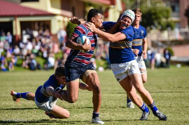 Tristan Stanghorn tackles Tipene Mavoa, but cannot prevent a try