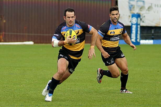 Man of the match Jono Lance with Ryan Louwrens riding shotgun