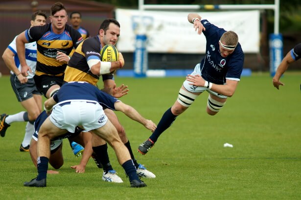 Jono Lance gets tackled as Phil Potgieter trips over blade of grass