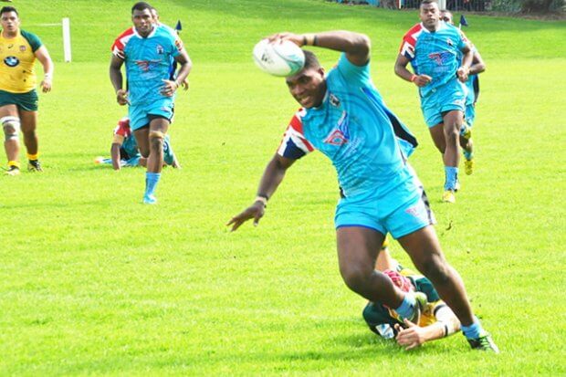 Jonacani Rogowale carries the ball Fijian style