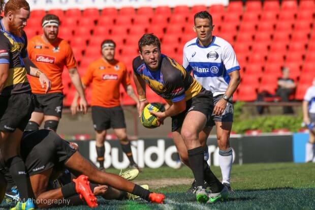 Ian Prior clears the ball.