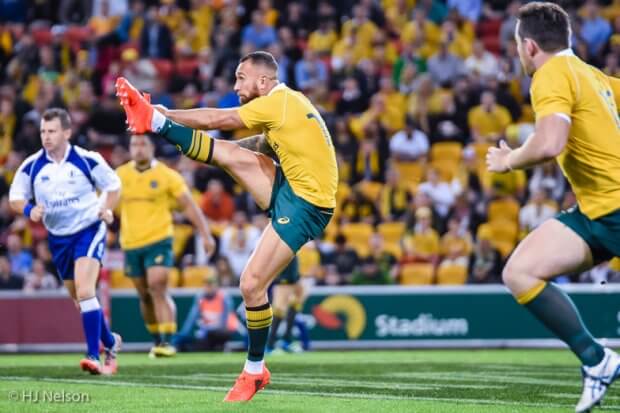 Quade Cooper clears the ball