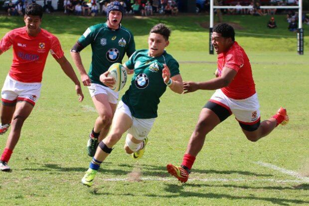 Tyzac Jordan evades tacklers on his way to the try-line