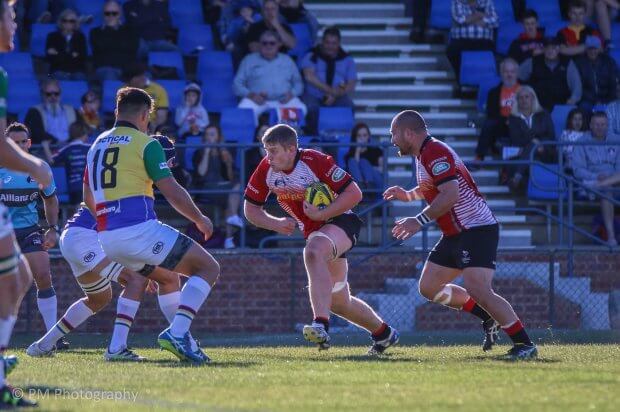 Tom Staniforth steams in.