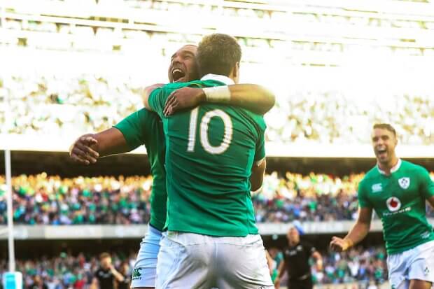 Johnny Sexton gives Simon Zebo a hug after he scores try 
