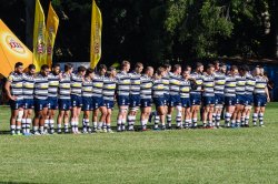 Brothers during the national anthem