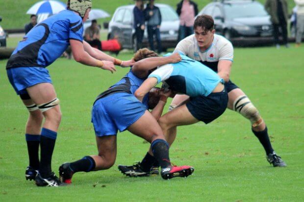 Lachlan Swinton helps out his winger