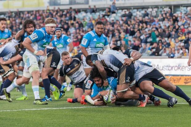 Akira Ioane rolls over to score the Blues' 2nd try