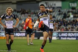 Hawera kicks for touch.