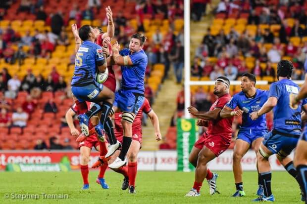 Marcel Brache takes a restart. Brache scored a try before leaving the field for a concussion test.